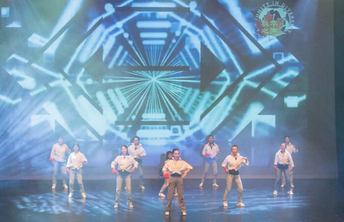 Group of women on stage dancing