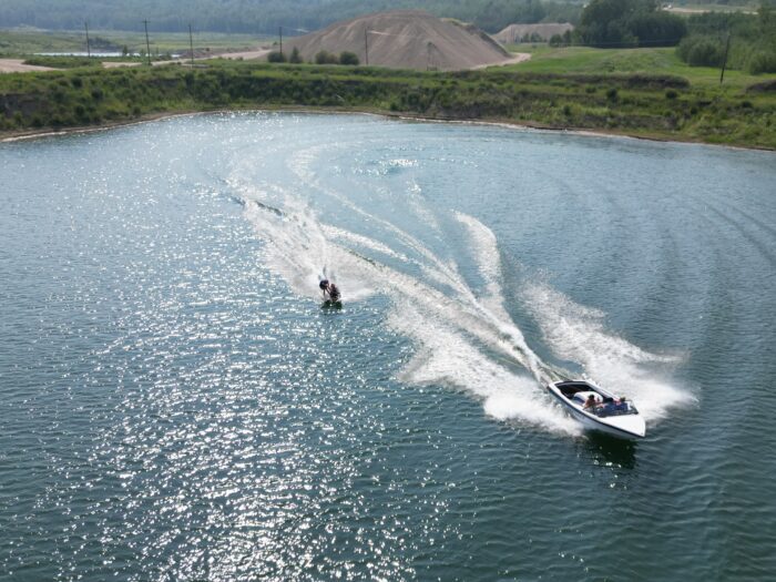 Two people waterskiing